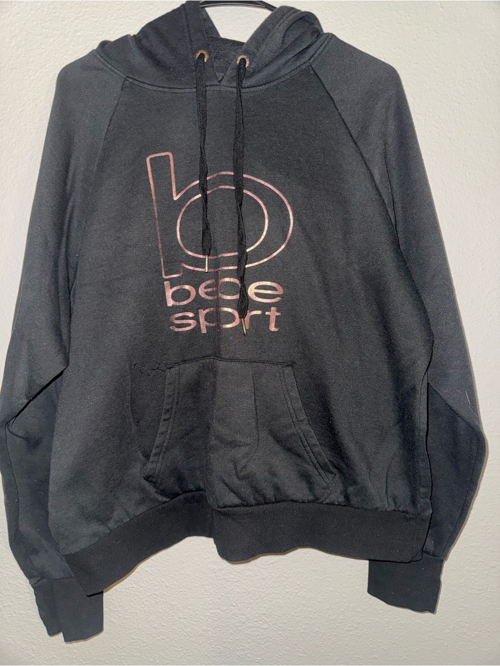 Bebe Black Pullover Hoodie with Rose Gold Logo Graphic
